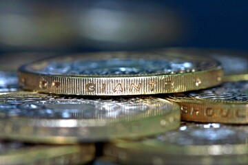 Nice shiny two pound coins in closeup and in high detail