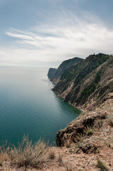Fototapeta premium View from a high cliff to Lake Baikal and the coastline