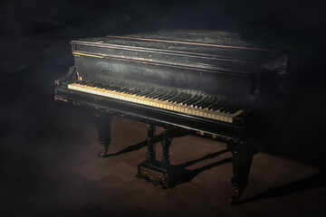 Old grand piano on the dark stage