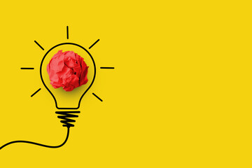 Creative thinking ideas and innovation concept. Paper scrap ball red colour with light bulb symbol...