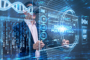 Business, Technology, Internet and network concept. Young businessman working on a virtual screen of the future and sees the inscription: Inbound marketing