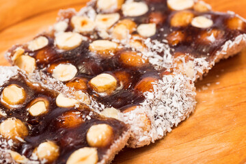 Sweets with hazelnuts and coconut flakes.