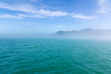 USA, Alaska, Craig. Fog on Gulf of Esquibel. - obrazy, fototapety, plakaty
