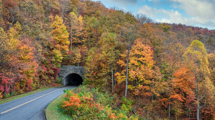 Beautiful autumn fall colors at tunnel entrance on the Blue Ridge Parkway near Asheville - North...