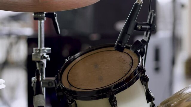 Closeup professional musical instrument. Drum kit for jazz band in zal. Drum set with drum cymbals