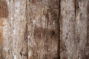 Texture of old painted cracked and bugged natural boards, pattern, texture, fence, abstract drawing