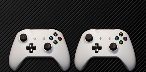 Dois controladores de videogame lado a lado em fundo preto