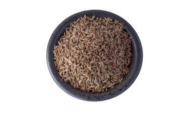 Black cumin in the cup on a white background