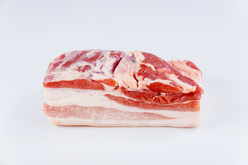Piece of raw pork belly isolated on white background.