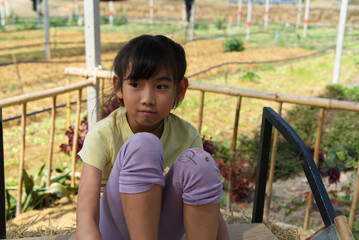 Portrait Asian cute Kid girl smiling happy	