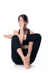 Obraz premium Beautiful sporty woman doing advanced yoga practice on white bac