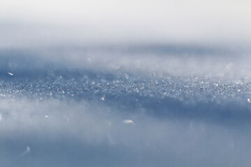 Winter snow. Snow texture Top view of the snow. Texture for design. Snowy white texture. Snowflakes.