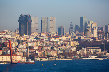 Picturesque panoramic view of modern cityscape of Istanbul from Topkapi across Golden Horn bay and Bosphorus at winter day