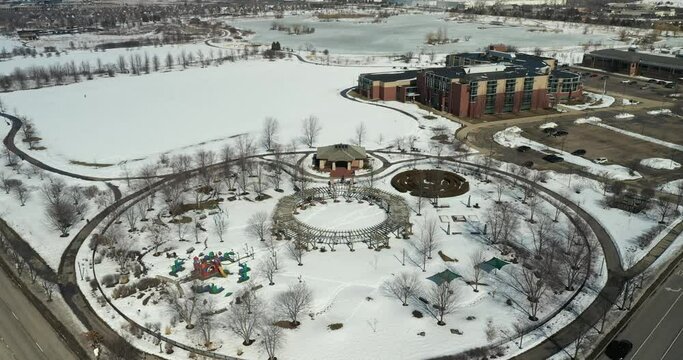 Aerial view of a playground on a pleasant winter day in a suburban setting