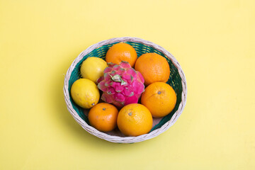 there are various kinds of fruit on a yellow background