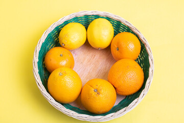 there are oranges on yellow background
