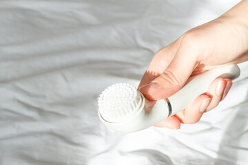 Daily treatments. Clean your face with a special cleaning brush.
