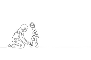 Single continuous line drawing of young Arabian mom help her son to tie shoelace before go to school, happy parenting. Islamic muslim family care concept. One line draw design vector illustration