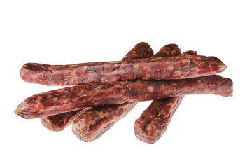 Dried jerked deer and pork sausage isolated on white