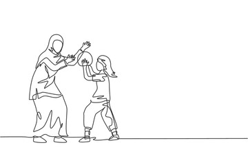 Fototapeta na wymiar One continuous line drawing of young Islamic mom playing basketball with daughter at outfield park. Happy Arabian muslim parenting family concept. Dynamic single line draw design vector illustration