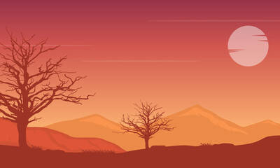 A stunning sunset panorama with views of the mountains and dry trees around it. Vector illustration