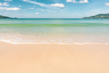Fototapeta na wymiar wave sea beautiful beach with white sand and blue sky, mountain. Seascape at Phuket Thailand