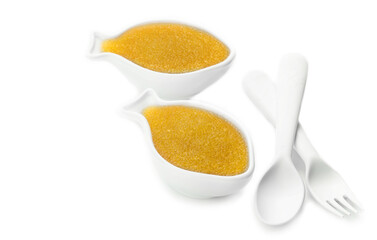salted yellow pike caviar in a ceramic bowl on a white plate