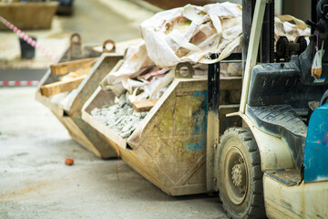 bobcat or a skid loader in a construction. view from behind.
