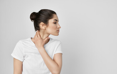 woman holding neck health problems discomfort medicine treatment