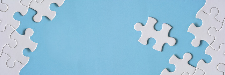 Jigsaw puzzle on a blue background  