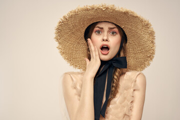 Cheerful woman in straw hat elegant style cosmetics close-up