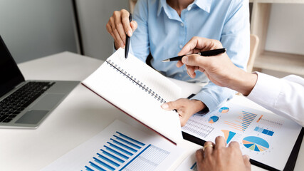 Business team briefing the idea and discussing exchange contract during brainstorming in office