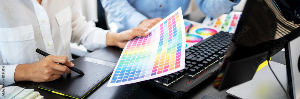 Fototapete graphic designer work with color swatch samples graphic skill concept. drawing sketches on graphic t