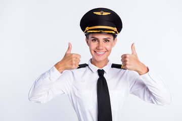 Photo of adviser pilot lady raise two thumbs up wear headwear aviator uniform isolated white color background - obrazy, fototapety, plakaty