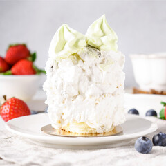 Delicious cake with fruits on background