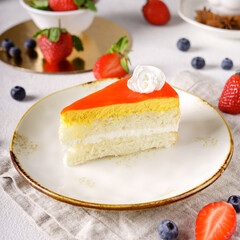 Delicious cake with fruits on background