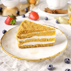 Delicious cake with fruits on background