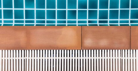 Panorama of Granite and drainage grates at the edge of the pool