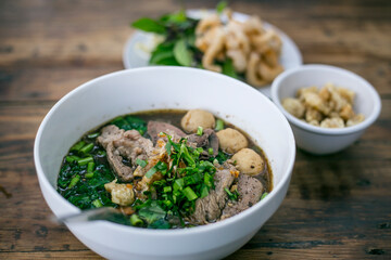 Thai style noodles on dark table background , Thai food concept