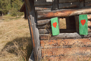 hearth shape over a wooden balcony in a small alpine cabine