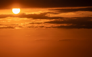 orange fiery sky and some clouds, nature background