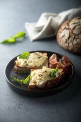 Homemade scrambled eggs with smoked ham