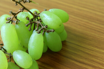 Grapes Fruit put on wooden table