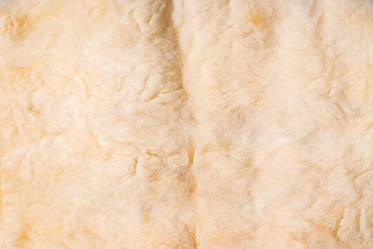 Close up photo of white wool cloth texture.
