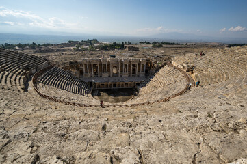 Fototapeta na wymiar View of ruins of ancient amphitheater in Hierapolis
