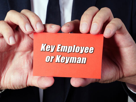  Financial concept meaning Key Employee or Keyman with inscription on the page.