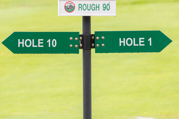 Signs for the tee off at the golf course, hole 1 and hole 10