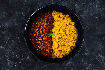 vegan spiced turmeric risotto with lentil mushroom bolognaise sauce, healthy plant-based food