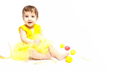 baby with painted eggs