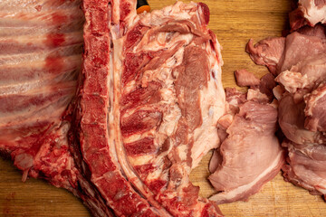 Fresh slaughtered pig ribs. Pork ribs with blood. Meat grown at home